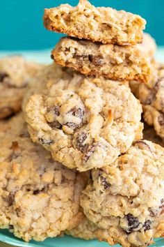 oatmeal chocolate chip cookies stacked on top of each other in a blue plate