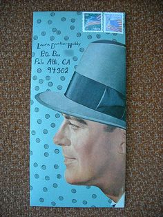 an image of a man with a hat on the cover of a postage stamp,