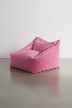 Instantly elevate your reading nook with the coziest bean bag chair with a plush velvet cover and supportive bead fill. Features a boxy silhouette for a modern look we love. This custom furniture piece will be made to order just for you. Features Cozy bean bag chair Plush velvet cover Bead filling offers a supportive seat Boxy silhouette adds a modern flair Made to order just for you Content + Care Arrives fully assembled Polyester; polystyrene beads Spot clean Made in the USA Size Dimensions: 33" l x 34" w x 27" h Interior seat dimensions: 20" l x 22" w x 13" h Weight: 20 lbs Shipping package dimensions: 36.25" l x 35.75" w x 31.25" h Shipping package weight: 24 lbs | Cooper Velvet Bean Bag Chair in Pink at Urban Outfitters Pink Love Chair, Comfy Bean Bag Chairs, Cool Bedroom Chairs, Cool Room Things, Cozy Seating Area In Bedroom, Bean Bag Chair Aesthetic, Seating In Bedroom, Cozy Bedroom Chair, Pink Bean Bag Chair