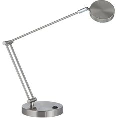 a desk lamp with a metal base and an adjustable arm, on a white background