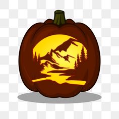 a carved pumpkin with mountains and trees on it, as well as the moon in the background