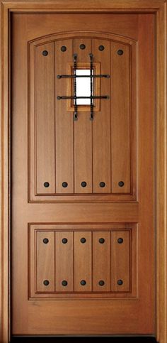 the front door is made of wood and has two sidelights on each side, one with