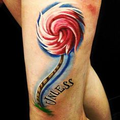 a colorful candy cane tattoo on the leg with words that say, unless it's sweet