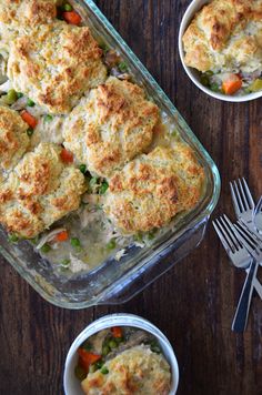 a casserole dish with chicken and vegetables in it next to a bowl of soup