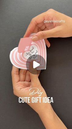 two hands holding cards with the words diy cute gift idea