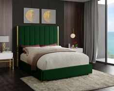 a bedroom with a green headboard and white bedding next to a large window