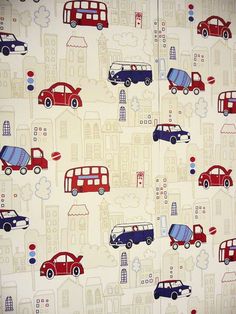 a wallpaper with cars and buildings on it in red, blue, and white