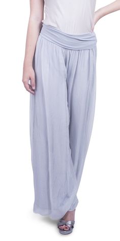 Flowing silk palazzo pant with elastic waist band and balloon hem. 100% Silk One Size | OS Made in Italy Viscose Wide-leg Pants With Elastic Waistband, Loosely Fitted Viscose Wide Leg Pants, Spring Silk Wide Leg Pants With Elastic Waistband, Silk Wide-leg Daywear Pants, Wide Leg Rayon Lounge Pants, Viscose Wide Leg Pants With Elastic Waistband, Silk Wide-leg Pants For Daywear, Silk Wide Leg Pants For Summer, Viscose Wide Leg Pants For Daywear