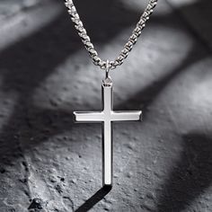 Faith is what determines one's mind, and distinguishes one from others. Simplicity meets masculine and spiritual power for a sleek look. Discover all our sleek 925 silver jewelry for men and find a gift for him. here Made with white gold plated 925 sterling silver. Dimension: 40 mm Length: 24 inches Chain: Box Chain 60 cm/ 23.6 Inches with Lobster Clasp Weight: 9.98g Origin: Imported More Choices Silver Cross Pendant, Jewelry For Men, Mens Pendant, Necklace Online, 925 Silver Jewelry, Silver Cross, Men Boys, Box Chain, Sterling Silver Necklace