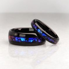 matching galaxy wedding bands, polished black tungsten rings with blue and purple nebula inlay, 8mm and 4mm matching ring set Galaxy Wedding Theme, Black Ring Set, Galaxy Wedding, Set Of Rings, Wood Keepsake, Perfect Wedding Ring, Galaxy Ring, Galaxy Nebula, Wooden Ring Box