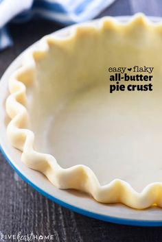 an all butter pie crust on a plate with the words easy and flaky