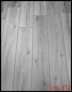 an image of wood flooring that looks like it has been painted gray and white