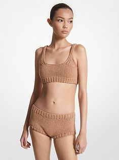 These hand-knit briefs debuted on the Spring/Summer 2024 runway, where they were styled with the matching cardigan and bra top. Spun from cashmere and cotton, they’re designed in a hipster shape and finished with thick ribbed trims. Complete the look with a woven bucket bag. 2024 Runway, Knitwear Fashion, 2024 Trends, Crochet Stuff, Michael Kors Collection, Spring Summer 2024, Italian Fabric, Bra Top, Knit Cotton