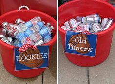 two red buckets filled with soda cans and cookies on top of each other next to an old timer's sign