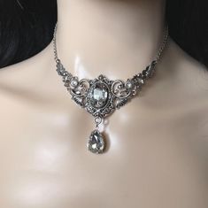 Choker: This elegantly ornate necklace is made with antique silver tone centerpieces, featuring lavish baroque details. Its mesmerizing design is accented with dazzling crystal clear glass crystals/jewels. Decorated portion is 4" wide and 2 1/2" tall in the very center.  Necklace length is adjustable 14"-17" with soldered stainless steel cable chain, lobster clasp and extender.If you would like a different length, please send us a message.Earrings: These dainty and elegantly ornate earrings are Antique Necklace Victorian, Gothic Antique, Ornate Necklace, Metal Choker, Victorian Wedding, Choker Pendant, Prom Jewelry, Stainless Steel Cable, Jewelry Choker