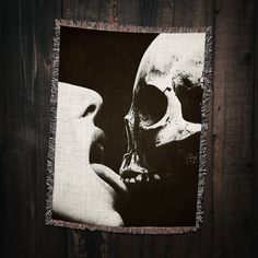 a black and white photo with a skull on it