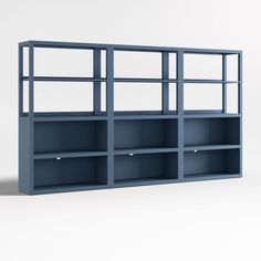 an empty blue bookcase with shelves on the bottom and one section missing from it