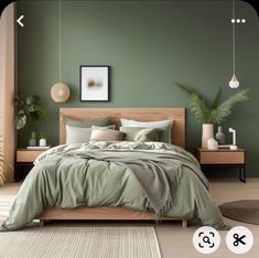 a bedroom with green walls and bedding in the center, two plants on either side of the bed