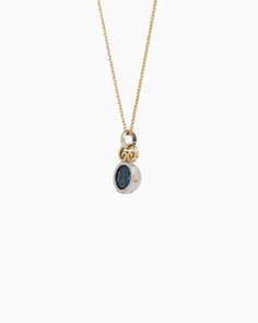 The Blue Moon Pendant combines simplicity with distinctive elegance. It showcases a delicate design, featuring a faceted London blue topaz stone set in sterling silver, complemented by a 14K gold petroglyph detail at the top. Pair with your favorite chain, sold separately. Metal: Sterling silver with 14K gold accent Stone: London blue topaz Dimensions: 18mm x 10mm Style #: P113LB White Gold Topaz Round Stone Jewelry, The Blue Moon, Blue Topaz Stone, Topaz Stone, Delicate Design, Gold Accent, Moon Pendant, London Blue Topaz, London Blue