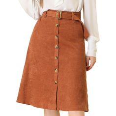 Indulge in a perfect blend of comfort and style with this ribbed corduroy A-line skirt. The high-fitted waist and slightly flared hem add a touch of elegance to the skirt, while the matching waist tie accentuates your curves, creating a flattering silhouette. The elastic waist and belted detail make it comfortable to wear all day long. This versatile skirt is suitable for any occasion, be it a party, a day out shopping, or a day at the office. The midi length adds a touch of sophistication to th High-waisted Brown Corduroy Skirt, Corduroy Skirt For Fall Workwear, Fall Corduroy Skirt For Workwear, Winter Corduroy Skirt With Button Closure, Solid Skirt With Button Closure For Fall, Solid Color Skirt With Button Closure For Fall, Brown Corduroy Bottoms With Buttons, Brown Knee-length Skirt With Button Closure, High-waist Brown Skirt With Button Closure