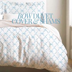 the cover and shams are white with blue designs