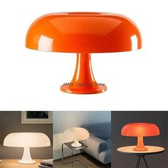 an orange lamp sitting on top of a table