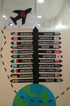 an airplane is flying over the world with many countries on it's back wall