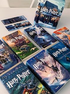 harry potter books laid out on a table with the book covers folded down in front of them