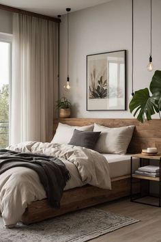 a bedroom with a bed, nightstands and plants on the wall next to it