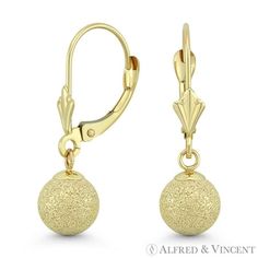 The featured earrings are cast in 14k yellow gold and showcase matte / satin-finished hollow ball beads finished with leverback posts for secure wear. Your purchase will include a 30-Day Exchange or Money-Back Guarantee & Free US Shipping. Please email us for more details regarding this listing. Size: 5 mm.  Color: Metal Type.  Gender: female.  Age Group: adult. Masonic Ring, Gold Jewelry Earrings, Leverback Earrings, Matte Satin, Charm Rings, Womens Wedding Bands, Three Stone Rings, Fine Earrings, Love Ring