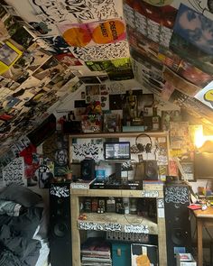 a room filled with lots of posters and pictures