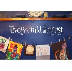 there is a sign that says every child is an artist