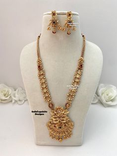 Matt gold finish Raani Haar(long necklace) comes with Earrings/bridal jewellery/south Indian long necklace Set/Rajwadi Rani Haar/Guttapusalu necklace/ one 1 gram gold/Ruby Green  All items are shipped from Brampton, Ontario, Canada. If you need your item by a certain day, please reach out to us for express delivery option before placing the order so that we can update the shipping for you. Standard shipping/delivery timeline Below are the estimated delivery times after the order is shipped/dispatched.  ---> USA delivery timeline * 3-5  business days to major urban centers in USA. It may take 2-3 days extra to remote locations ---> Canada delivery timeline  * 2-3 business days - GTA  & Montreal  * 2-4  business days - Rest of Ontario/Quebec * 4-6 business days-  Rest of Canada (Please consi Heavy Gold Pendent Designs, Medium Size Necklace Gold, Raani Haar Gold Jewellery Designs, Bridal Necklace Set Gold, Rani Haar Gold Indian Bridal, Gold Rani Haar Indian, Rani Haar Gold Jewellery Designs, Gold Necklace Long, Gold Rani Haar New Design