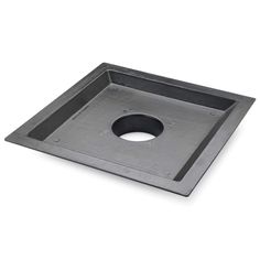 a square metal tray with a hole in the middle