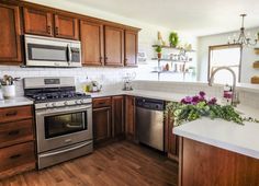 the kitchen is clean and ready for us to use in its new owner's home