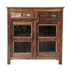 an old wooden cabinet with glass doors