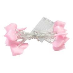 a pink bow with silver wire and hearts on the end is shown in front of a white background