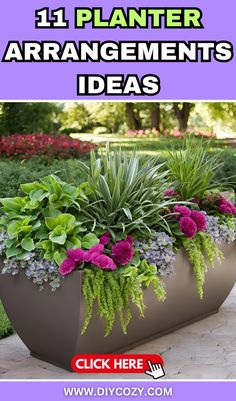 a large planter filled with flowers and plants