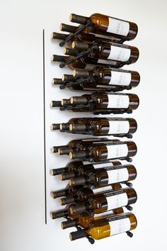 caption White Panel with Triple Deep Black Anodized Pegs (discontinued peg finish Wine Wall Display, Perimeter Lighting, Led Accent Lighting, Wall Mounted Wine Rack, Wine Wall, Wine Display, Metal Rack, Wine Rack Wall, Bottle Storage