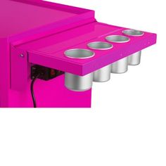 a pink coffee table with four cups on the top and one cup in the middle