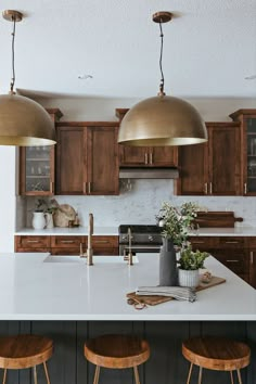 kitchen styling Amy Koehn KoehnDesign Consulting Calgary Interior Design Midcentury Transitional Kitchen, Kitchen Backsplash Walnut Cabinets, Two Tone Kitchen Island And Cabinets, Earthy Moody Kitchen, Warm Brown Cabinets Kitchen, Old Home Kitchen Remodel, Brown And Gold Kitchen, Modern Comfy Living Room Ideas, Brown Home Interior