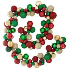 an assortment of christmas ornaments arranged in the shape of a letter o on a white background