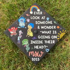 a graduation cap with the words, ever look at someone & wonder what is going on inside their head?