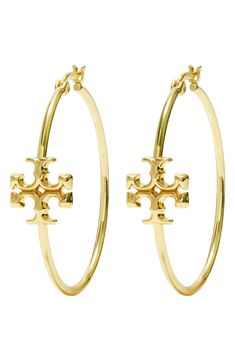 Tory Burch medallions add a sophisticated signature element to dramatic hoop earrings in gleaming goldtone plate. 1 1/2" hoop diameter Snap-post closure Goldtone plate Imported Tory Burch Earrings, Graduation Photoshoot, Tory Burch Jewelry, Hoop Design, Hoop Earrings Gold, Earrings Hoop, Jewelry Lookbook, Dream Jewelry, Faux Flowers