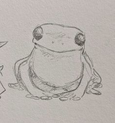 a drawing of a frog sitting next to a person with a hat on their head