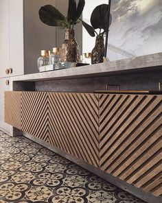 the counter is made out of wood and has an interesting pattern on it's surface