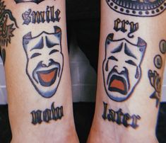 two people with tattoos on their legs that say smile and laugh, one has a clown's face