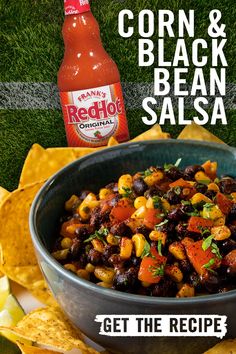 corn and black bean salsa in a bowl with tortilla chips on the side