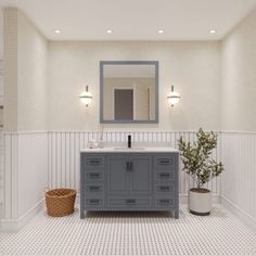 a bathroom with a sink, mirror and potted plant on the floor in front of it