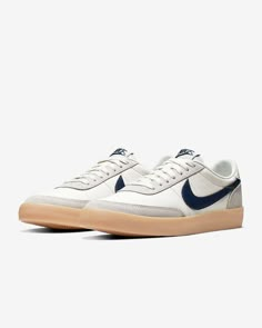 YOUR GO-TO OG SHOE. Inspired by the OG low-profile tennis shoe, the Nike Killshot 2 updates the upper with a variety of textured leathers to create a fresh look. From soft suedes to smooth leathers with the perfect sheen, it's court-side attitude with a modern touch. To prove you're on top, the rubber gum sole adds the cherry on bottom. Benefits The variety of leathers add depth, durability and let you wear your style from uptown to downtown. The rubber gum sole adds a retro look and durable traction. The "NIKE" on the heel and bold Swoosh add heritage styling. Shown: Sail/Gum Yellow/Midnight Navy Style: 432997-107 Brand New, never used or worn. Nike box included, some shipping damage to box. Bid with confidence as we have been selling on eBay for 20 years! Shipping: Orders will be shipped Nike Leather, Nike Shoe, Men Nike, Men's Shoe, Navy Shoes, Navy Fashion, Blue Nike, Midnight Navy, Inspiration Mode